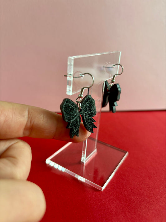 Rusetti-korvakorut, musta glitter